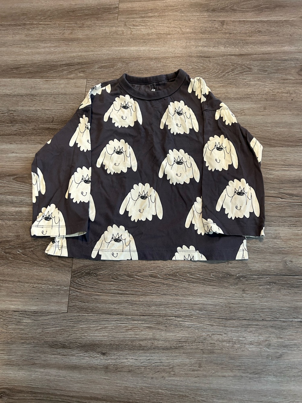 H&M Black Long-Sleeve Tee with Cream Cartoon Floral Faces